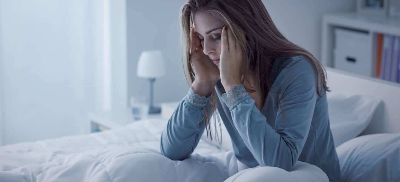 kvinne føler seg uvel. Må personer med diabetes overkompensere for å unngå fravær, spør Marte